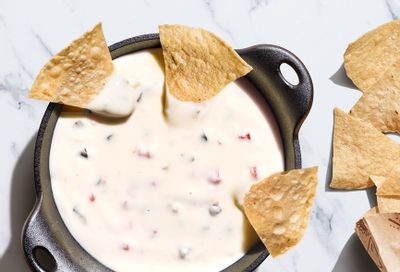 Four Days Only: Get a Free Topping of Queso Blanco with an In-app or Online Entree Purchase at Chipotle