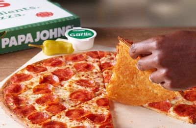 Papa Johns Unveils their New Crispy Parm Pizza with a Parmesan and Romano Cheese Blend